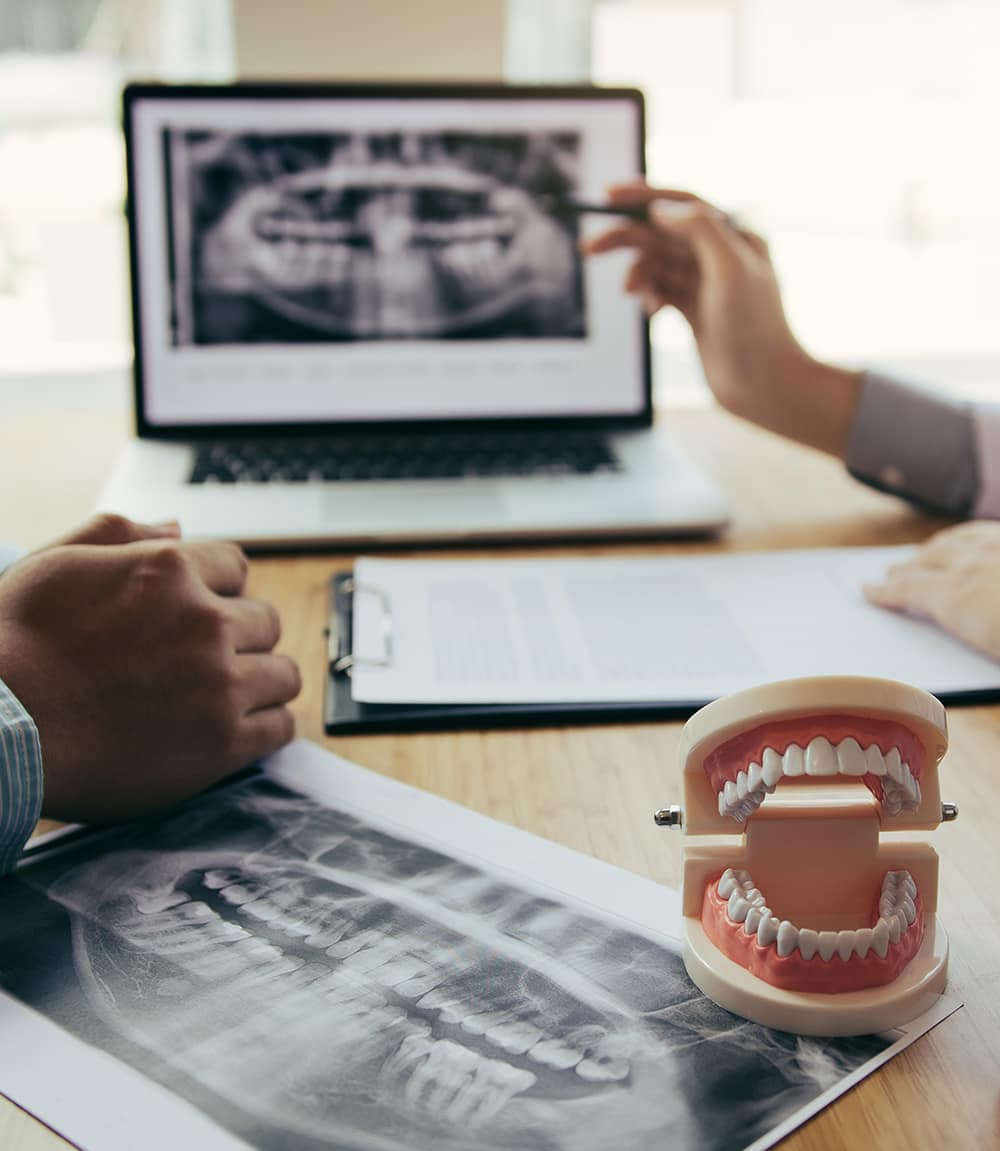 Dentist consulting patient on dental problems virtual dental consultation